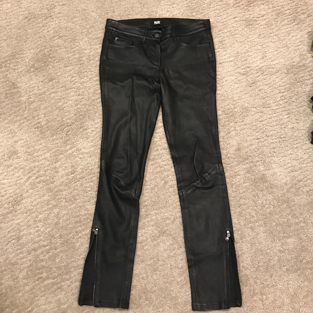 Genuine leather pants with zips at hem.